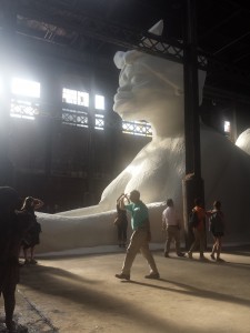 Sideview of the main sculpture in the Kara Walker exhibit "A Subtlety, or the Marvelous Sugar Baby". Photo by Dána-Ain Davis. 