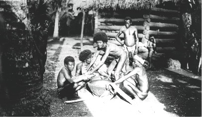 Trobriand men preparing to cook mona. Photo courtesy of Michael Young.
