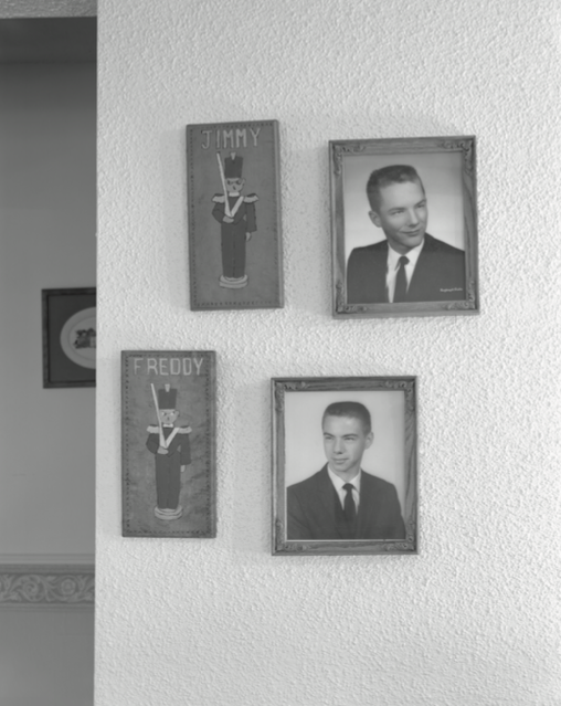 Figure 8. Photographs of brothers Fred and Jim McDaniel hang on a wall in Fred’s home, Bonne Terre, Missouri. The son of a miner who worked at the Bonne Terre lead mine until its closure in 1962, Fred is now retired. In 1965, his brother Jim was killed in an automobile accident during his commute to St. Louis, where he worked at McDonald Douglass building space capsules used in Apollo missions. Although Fred lived most of his adult life away from the Old Lead Belt, he decided to retire to the small mining town where he was raised.